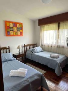 En eller flere senge i et værelse på Casa con vista al mar, Punta del Este