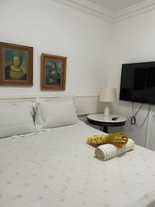 Giường trong phòng chung tại UNU The Plaza Ondina +47 ảnh