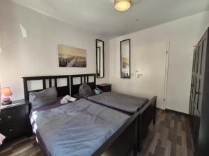 Postel nebo postele na pokoji v ubytování Mikra Homes24 in Meerane