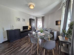 TV a/nebo společenská místnost v ubytování Mikra Homes24 in Meerane