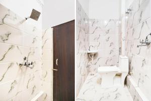 Ένα μπάνιο στο Collection O Ak Hotels