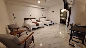 Una cama o camas en una habitación de Hotel Casa Vivaldi