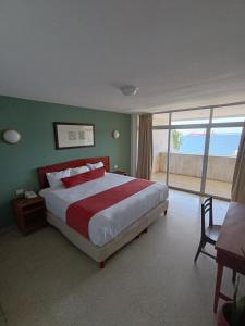 Postel nebo postele na pokoji v ubytování Hotel Royalty