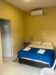 Кровать или кровати в номере Pousada BG Lençóis +25 фотографий