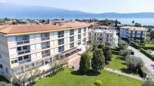 an aerial view of a building with a park at Riva chiara in Toscolano Maderno