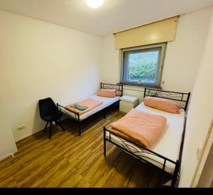 Postel nebo postele na pokoji v ubytování House A44