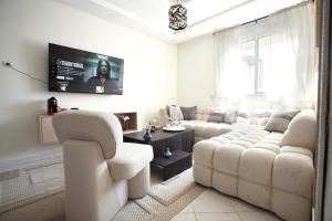 TV a/nebo společenská místnost v ubytování GRAND OPENING 50 Percent Off for First Ten Guests