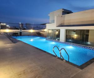 Bazén v ubytování Visthara Elite nebo v jeho okolí