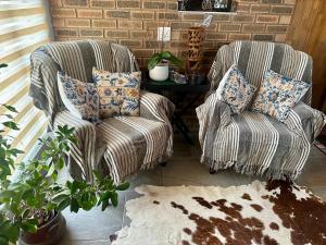 Et opholdsområde på Prag Overnight Room