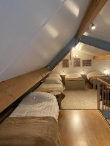 Postel nebo postele na pokoji v ubytování B&B Logeren bij van Heeren