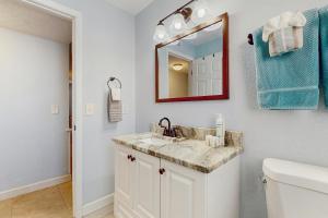 Koupelna v ubytování Blissful Beach Retreat D