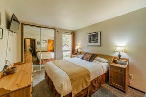 Postel nebo postele na pokoji v ubytování Austria Hof Lodge + 231 fotografií