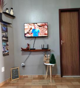 TV a/nebo společenská místnost v ubytování Casinha do Beco 01 + 16 fotografií