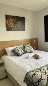 En eller flere senge i et værelse på Apartamento Campinas ao lado Puc 2 + 22 billeder