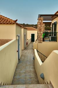 a walkway in the middle of a building at Element Hotel in Elafonisos