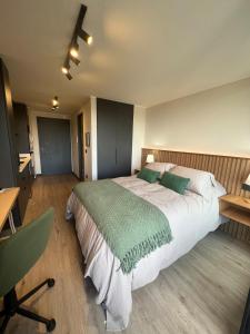 Postel nebo postele na pokoji v ubytování Suite Compacta y Elegante