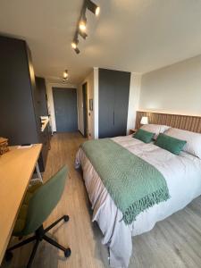 Postel nebo postele na pokoji v ubytování Suite Compacta y Elegante