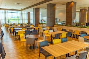 Un restaurant u otro lugar para comer en Hotel Contemporâneo - Royal Palm Hotels & Resorts