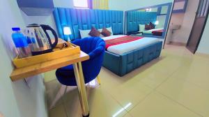 Postel nebo postele na pokoji v ubytování Jabulani Lodge