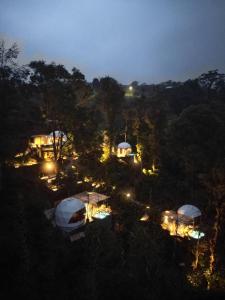 a view of a group of tents at night at Alma Glamping in Xalapa