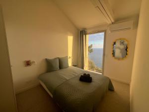 Postel nebo postele na pokoji v ubytování Casa Favelas, Vue Mer, plages et Monaco à pieds