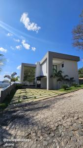a house on the side of a road at Casa Amaral in Capitólio