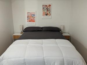 Postel nebo postele na pokoji v ubytování The Global Nook - Private Room near Times Square + 14 fotografií