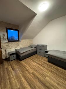 Posezení v ubytování Monteurwohnung Neustadt an der Weinstraße