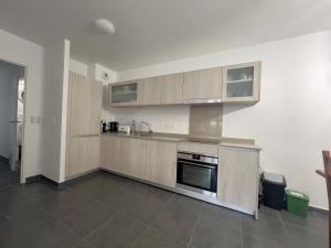 Kuchyň nebo kuchyňský kout v ubytování Appartement cosy pour 5 pers. à Arcachon avec balcon et équipements complets - FR-1-474-213