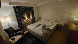 Ένα ή περισσότερα κρεβάτια σε δωμάτιο στο Fiskecamp Rusksele +90 φωτογραφίες