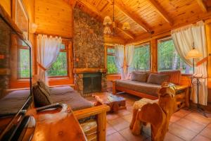 Гостиная зона в Cabañas En el Corazón del Bosque