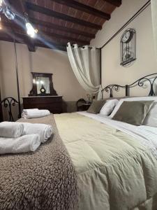 Ένα ή περισσότερα κρεβάτια σε δωμάτιο στο Locazione turistica ex Le Casette Di Cedromonte +50 φωτογραφίες