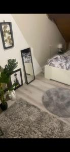 En eller flere senge i et værelse på Lodelinsart