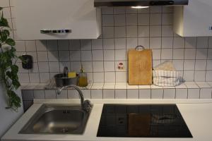 Kuchyň nebo kuchyňský kout v ubytování La Piccola Taverna + 10 fotografií