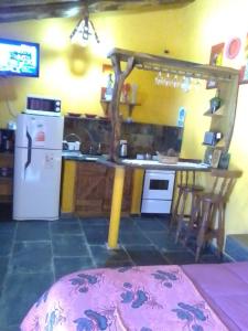 Kuchyň nebo kuchyňský kout v ubytování Cabañas Ojo de Agua