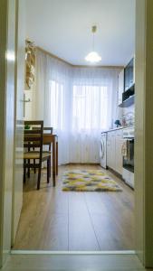 Kuchyň nebo kuchyňský kout v ubytování Bella Apartment