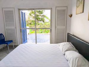 Un pat sau paturi într-o cameră la Apartamento familiar