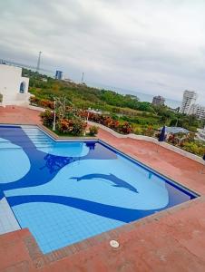 Piscina de la sau aproape de Apartamento familiar