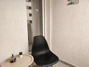 Et opholdsområde på 1Bedroom Sofa 1child Full Kitchen Free Parking