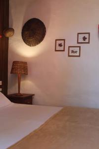 Postel nebo postele na pokoji v ubytování Pousada Regina Guest House - Chalé 1