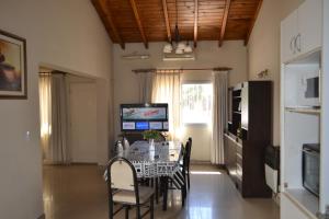 Μια τηλεόραση ή/και κέντρο ψυχαγωγίας στο Casa ideal hasta 7pax con cochera propia