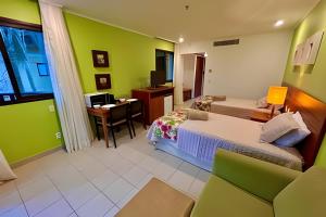 Et tv og/eller underholdning på Flat de Luxo no Costabella Marina Resort Angra