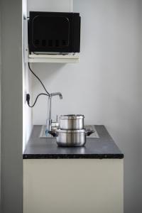 Η κουζίνα ή μικρή κουζίνα στο Cosy studio flat in Edgware HA8