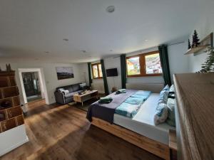 Ένα ή περισσότερα κρεβάτια σε δωμάτιο στο Ferienwohnung Vordere Halde