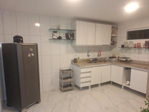 Køkken eller tekøkken på Recanto da Praia