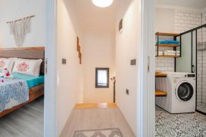 En eller flere senge i et værelse på Villa Rengin Datça Stone House