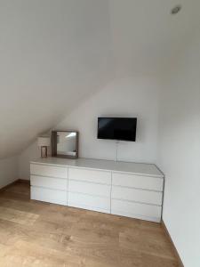 Et tv og/eller underholdning på Duplex au pied de la ville + 17 billeder