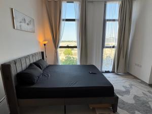 Ένα ή περισσότερα κρεβάτια σε δωμάτιο στο Mamsha