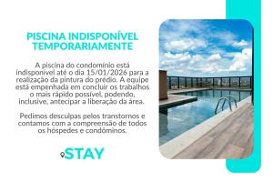 un volantino per una piscina in un resort di STAY Vivence Suítes a Palmas