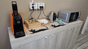 Una cocina o kitchenette en beb MUFFIN 4 fotos más